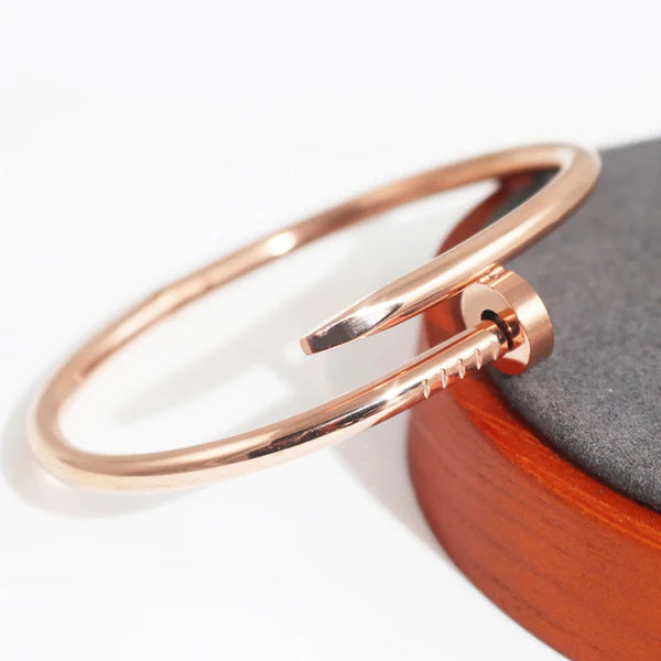 Sleek Rose Gold Nail Bracelet
