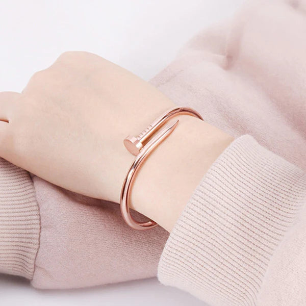 Sleek Rose Gold Nail Bracelet