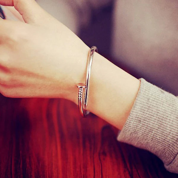 Sleek Rose Gold Nail Bracelet